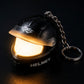 Helmet keychain with flashlight