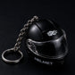 Helmet keychain with flashlight